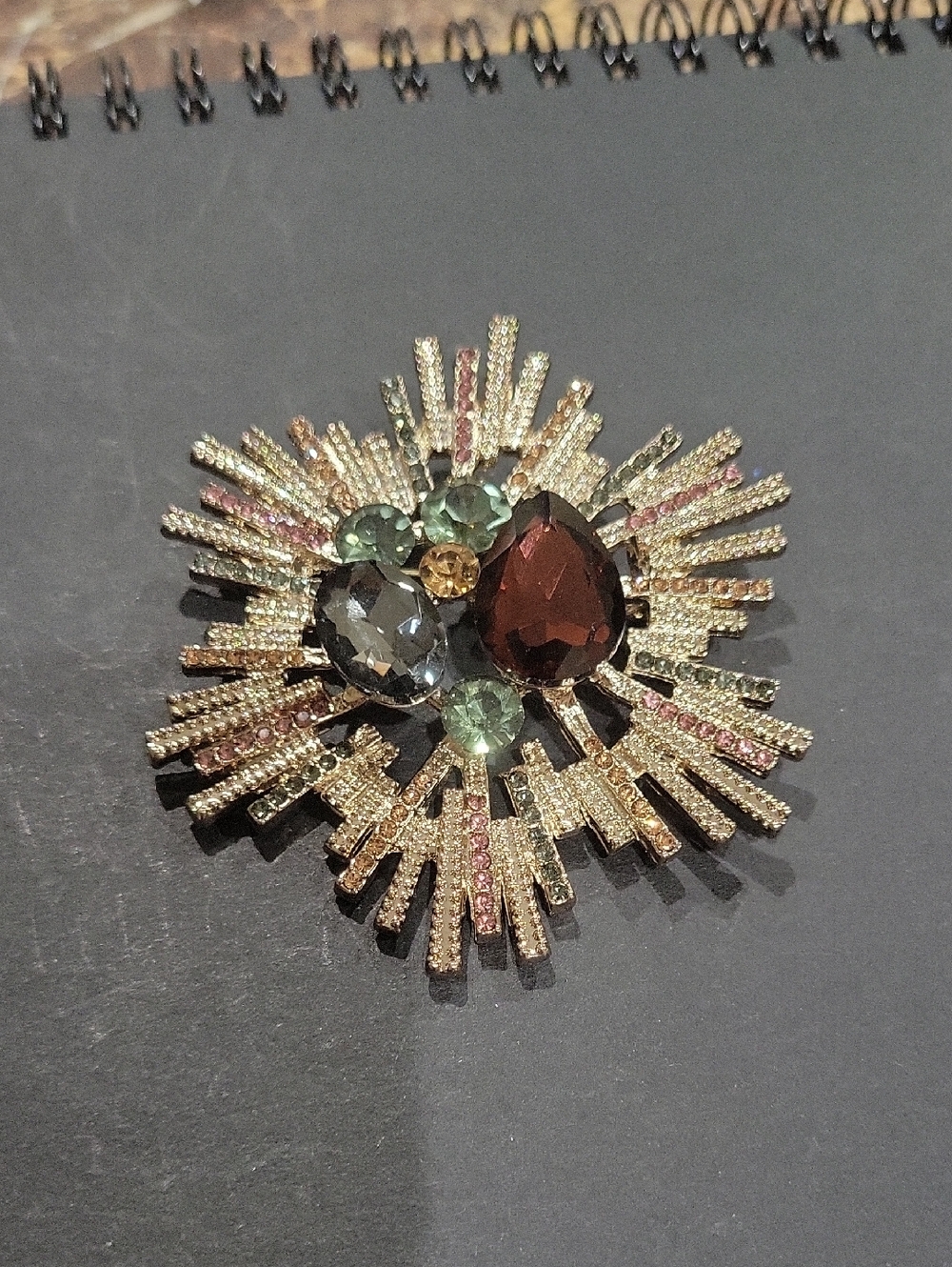 Gold-Tone Sunburst Crystal Brooch with Multicolor Gemstones